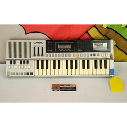 Used Casio PT-50 small keyboard with analogue rhythm, accompaniment & ROM-Packs (RO-301 & RO-303) ISS28918